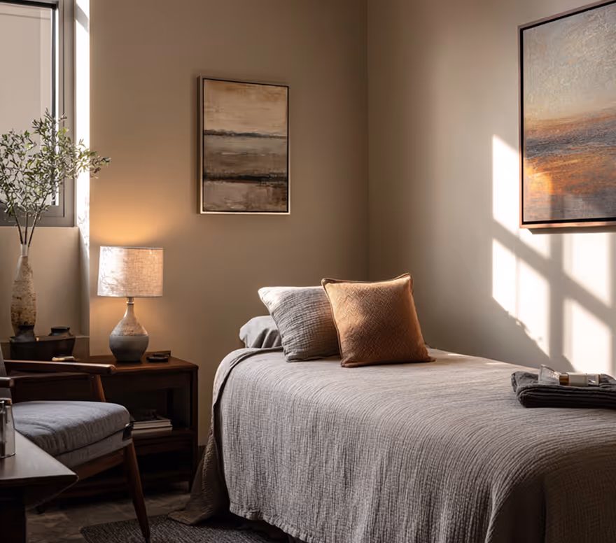 Quiet clinic consultation room with a treatment bed