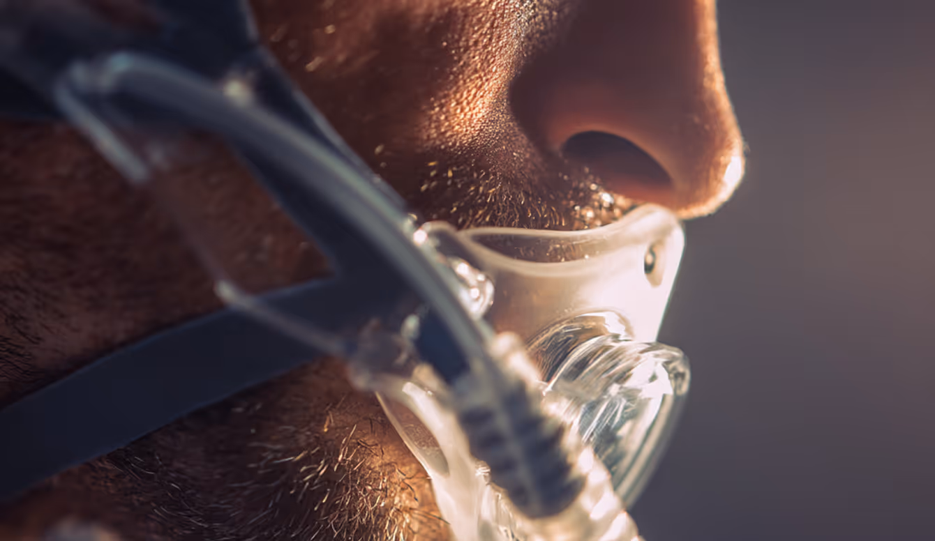 Athlete breathing through an exercise testing mask