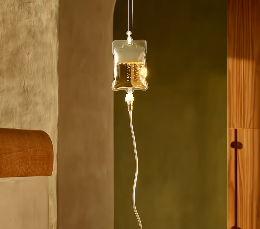 IV fluid bag hanging in a treatment room